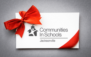 communities in schools jacksonville card with ribbon