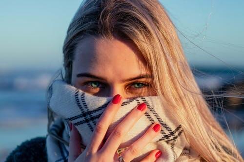 girl with scarf face covering